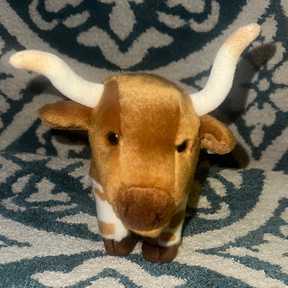 Brown and White Plush Bull Toy